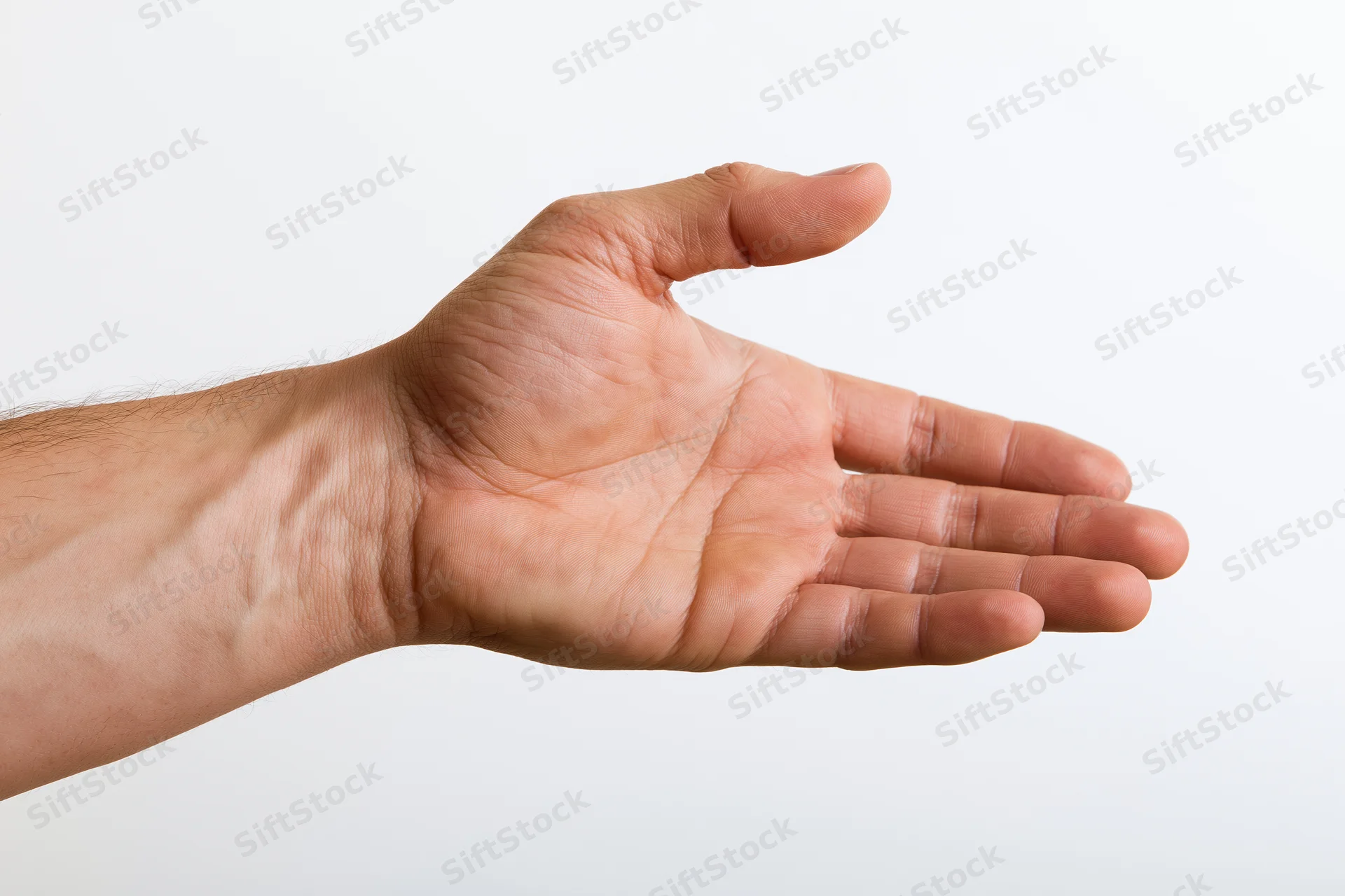 Male hand and forearm making a gentle grasping gesture against white background