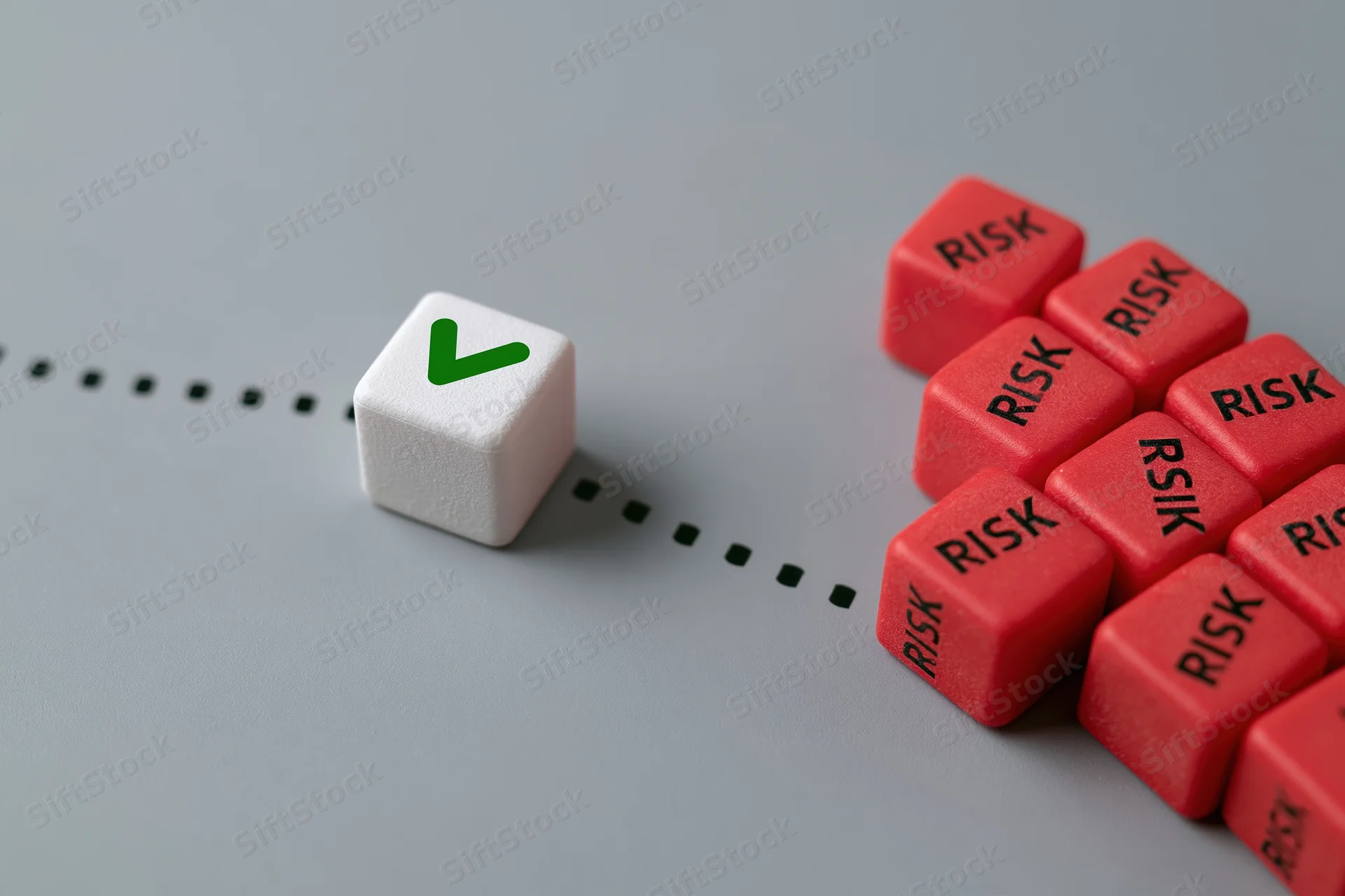 White cube with green checkmark moving along dotted path away from red dice labeled risk