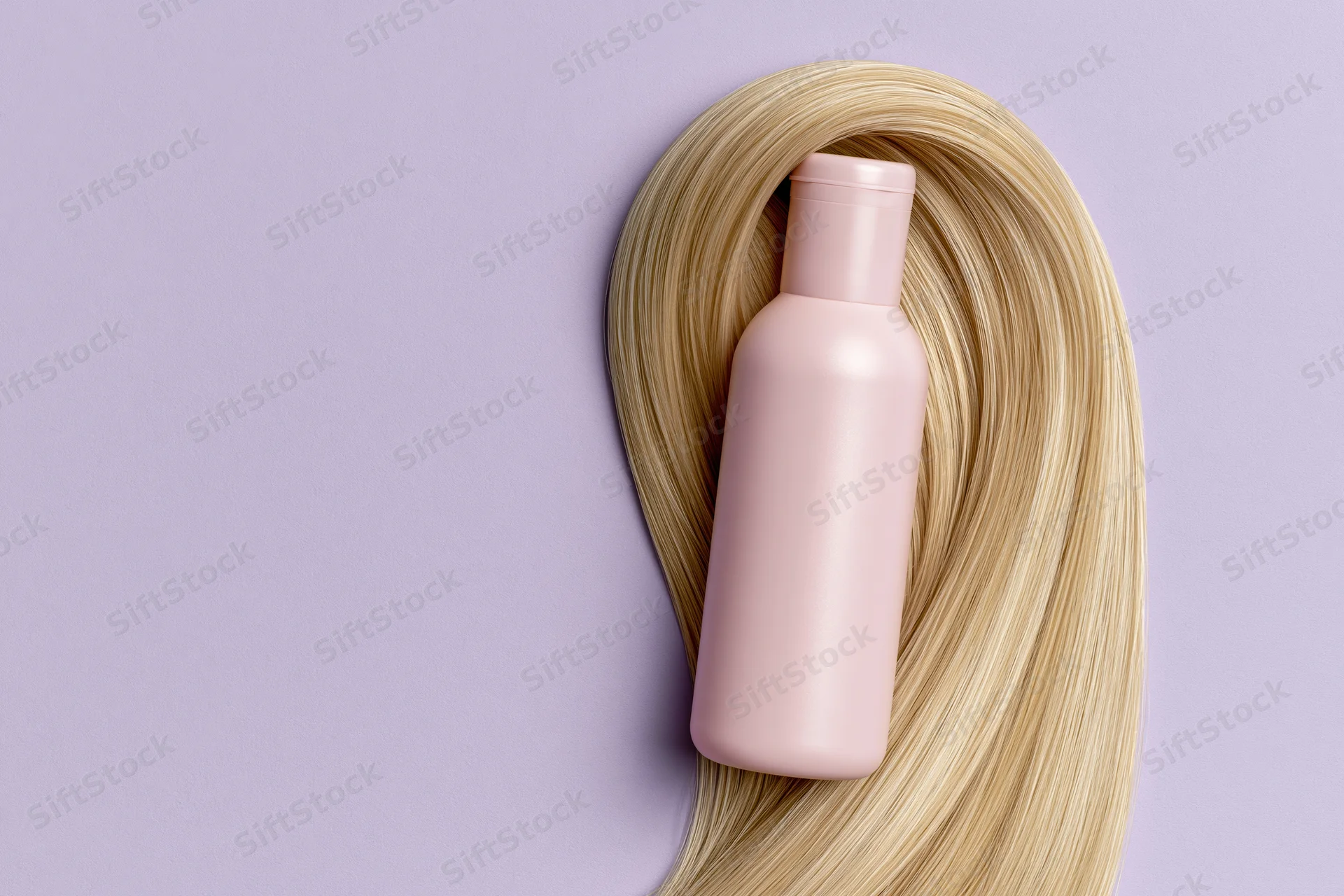 Pink shampoo bottle resting on a swirl of blonde hair against a lavender background