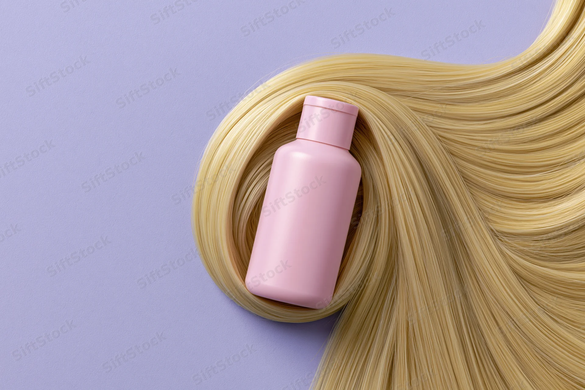 Blonde hair arranged in a swirl with a pink plastic shampoo bottle nestled inside, on a lavender background