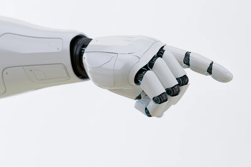 Robotic hand with extended index finger pointing forward against white background