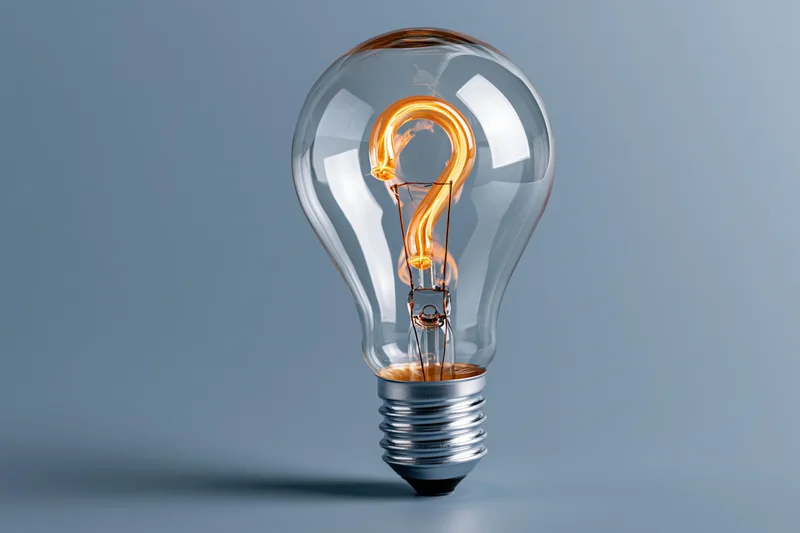 Glowing incandescent lightbulb with question mark filament on blue background