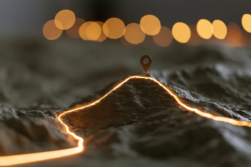 Illuminated path tracing a peak on a 3d topographic terrain model