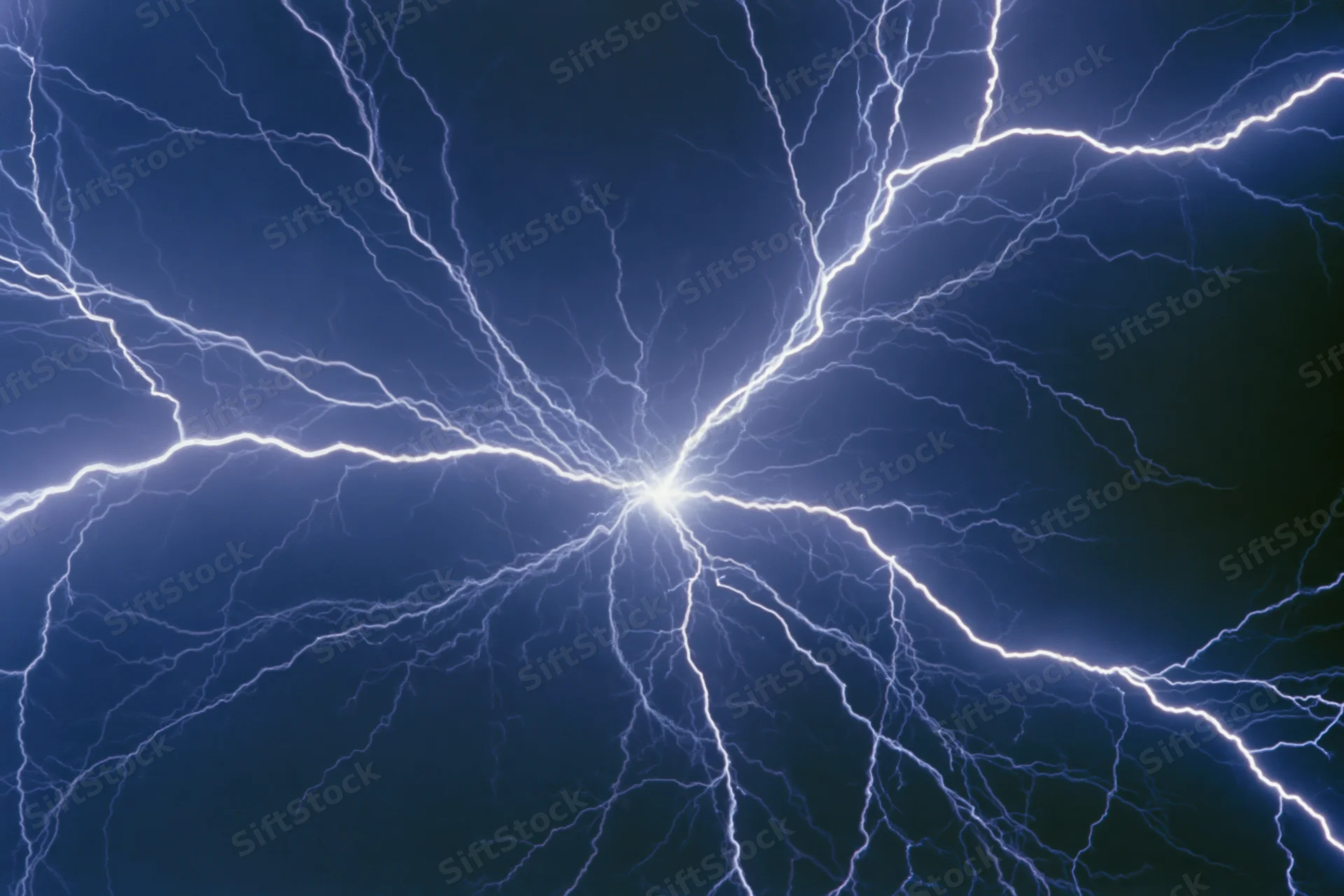 Branching lightning bolts radiating from a central point against a dark blue background