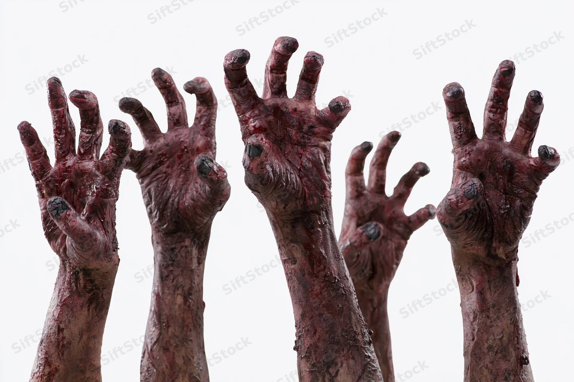 Five rotting zombie hands reaching upward against white background