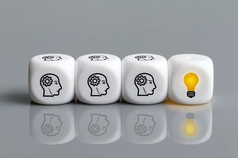 Four white dice in a row with brain symbols and one glowing lightbulb on a reflective gray surface