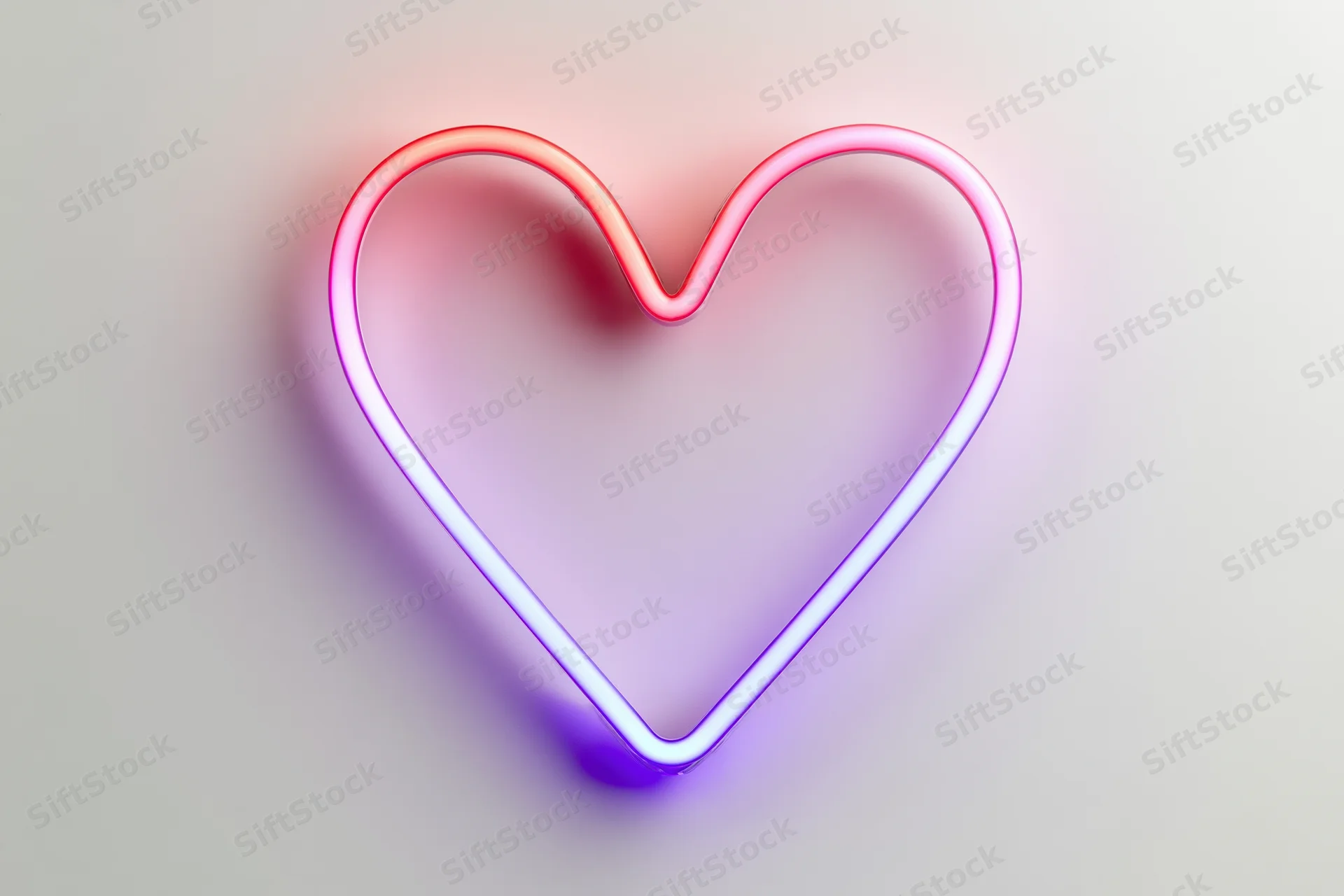 Neon heart outline glowing in pink and purple on a white wall