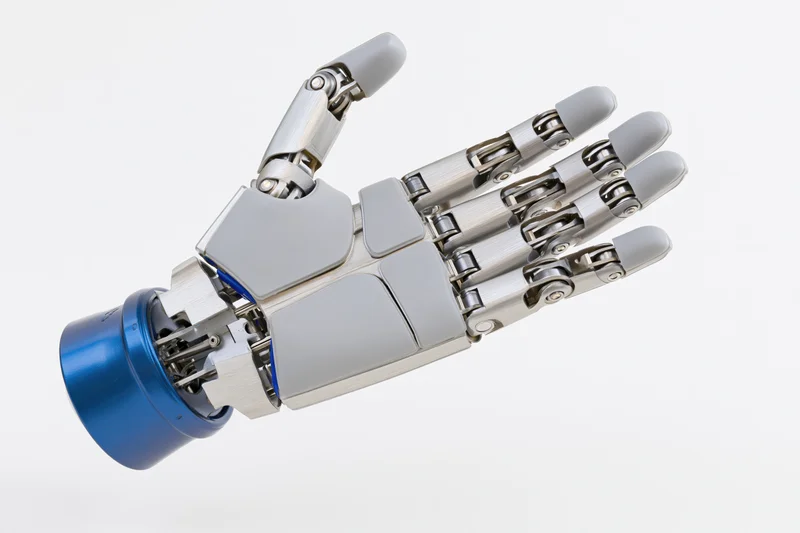 Robotic prosthetic hand with open palm facing forward isolated on white background