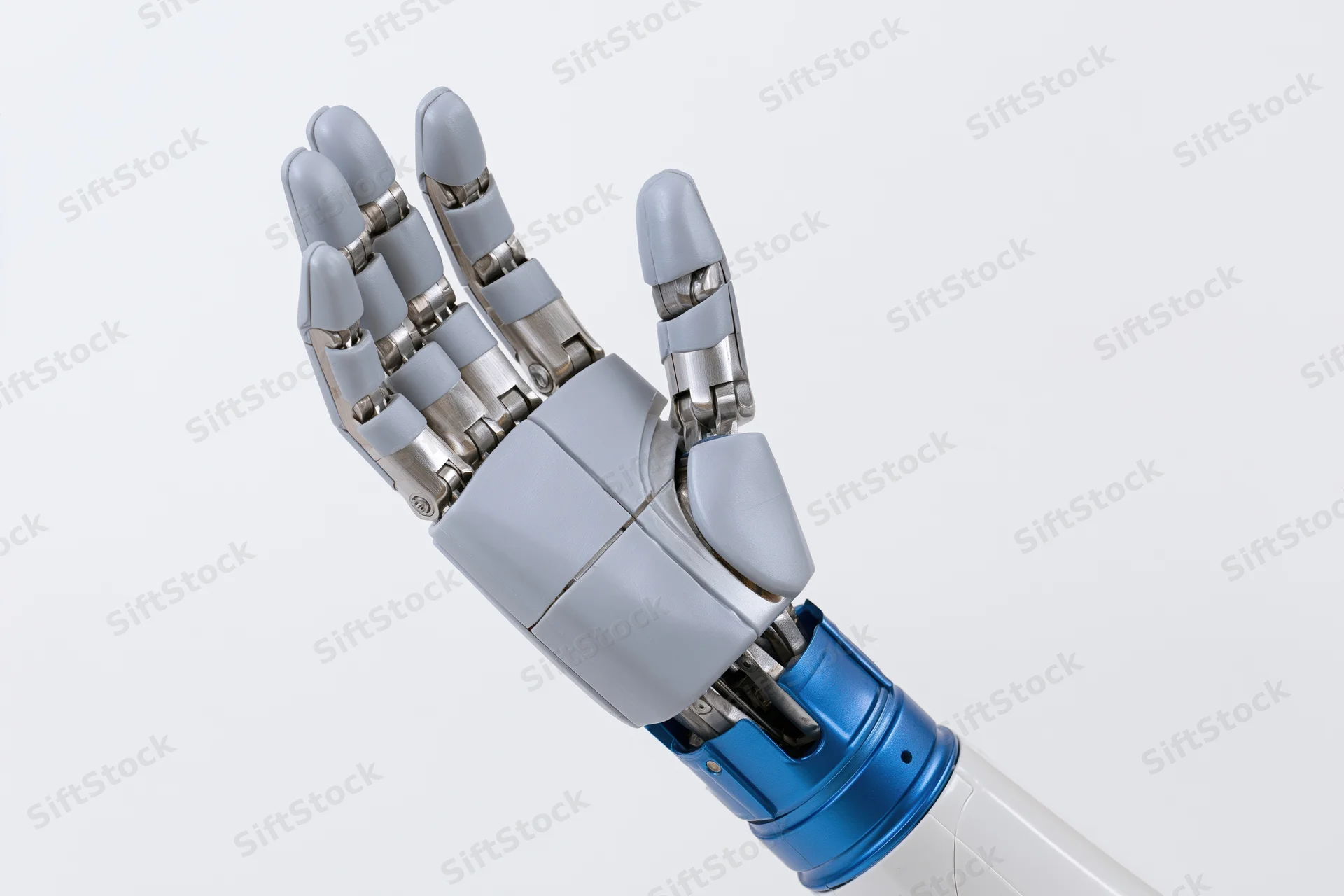 Robotic prosthetic hand raised with open palm against white background