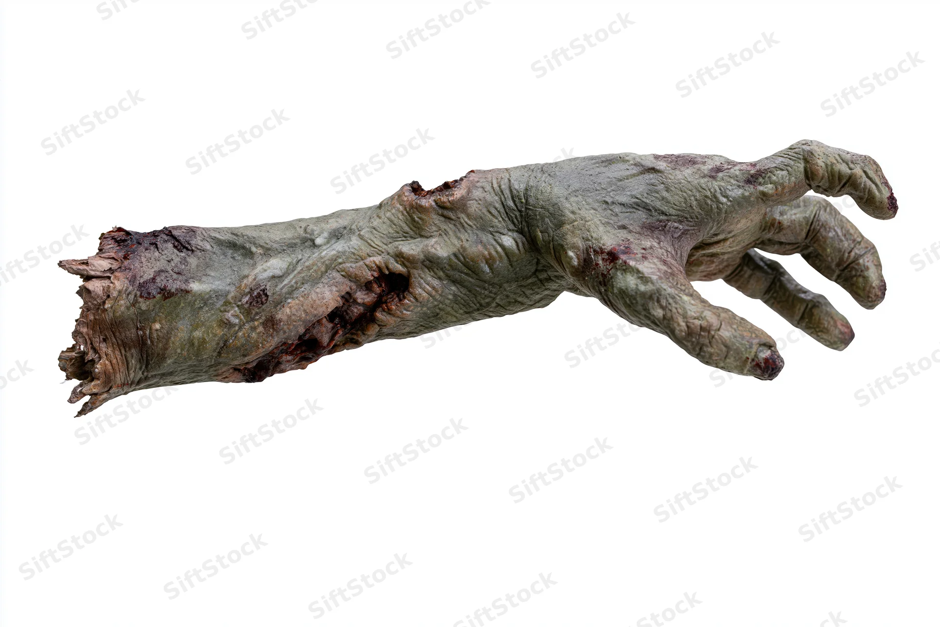Severed zombie hand and forearm prop reaching forward isolated on white