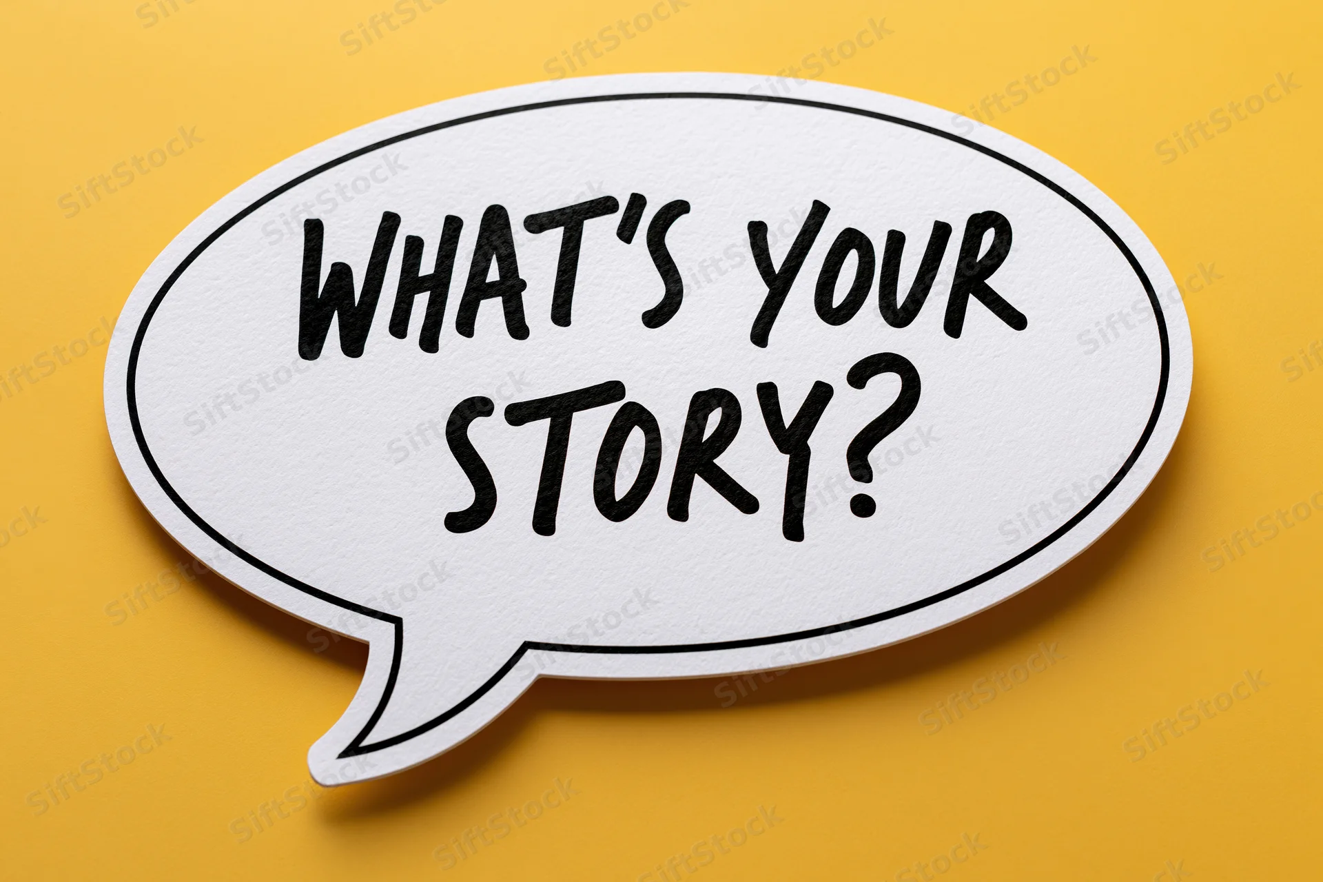 White speech bubble with bold black handwrit text reading what's your story on yellow background