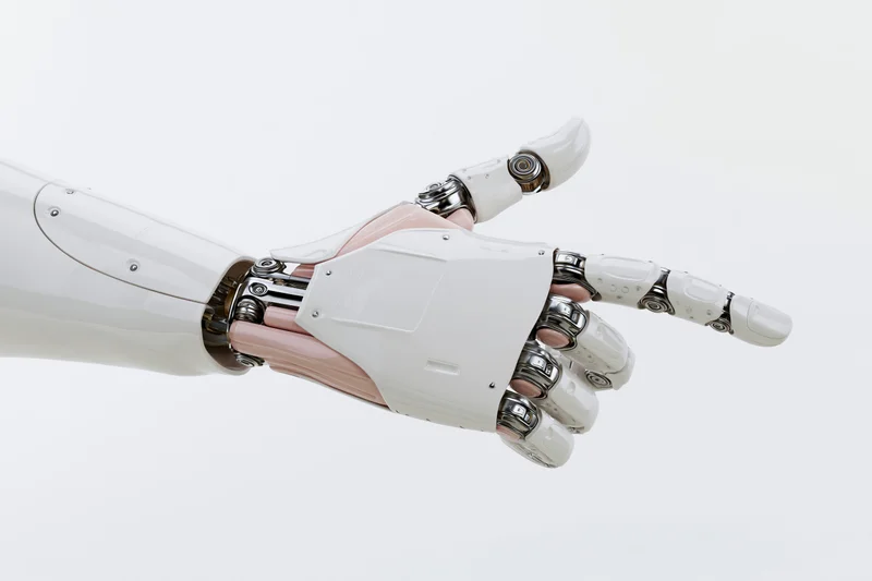 Robotic hand extended forward with index finger pointing against white background