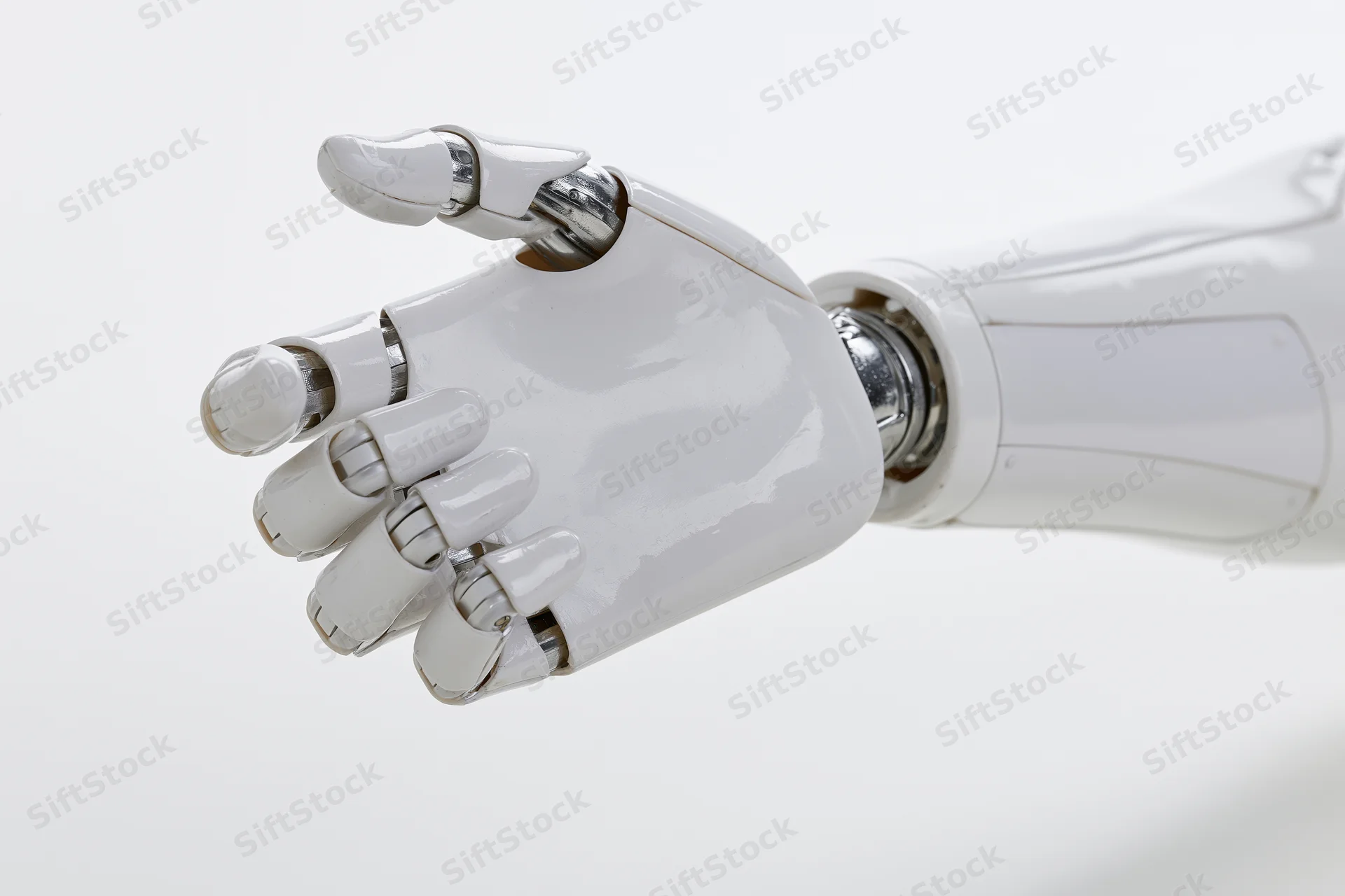 White robotic hand with slightly curled fingers extending from forearm against plain background