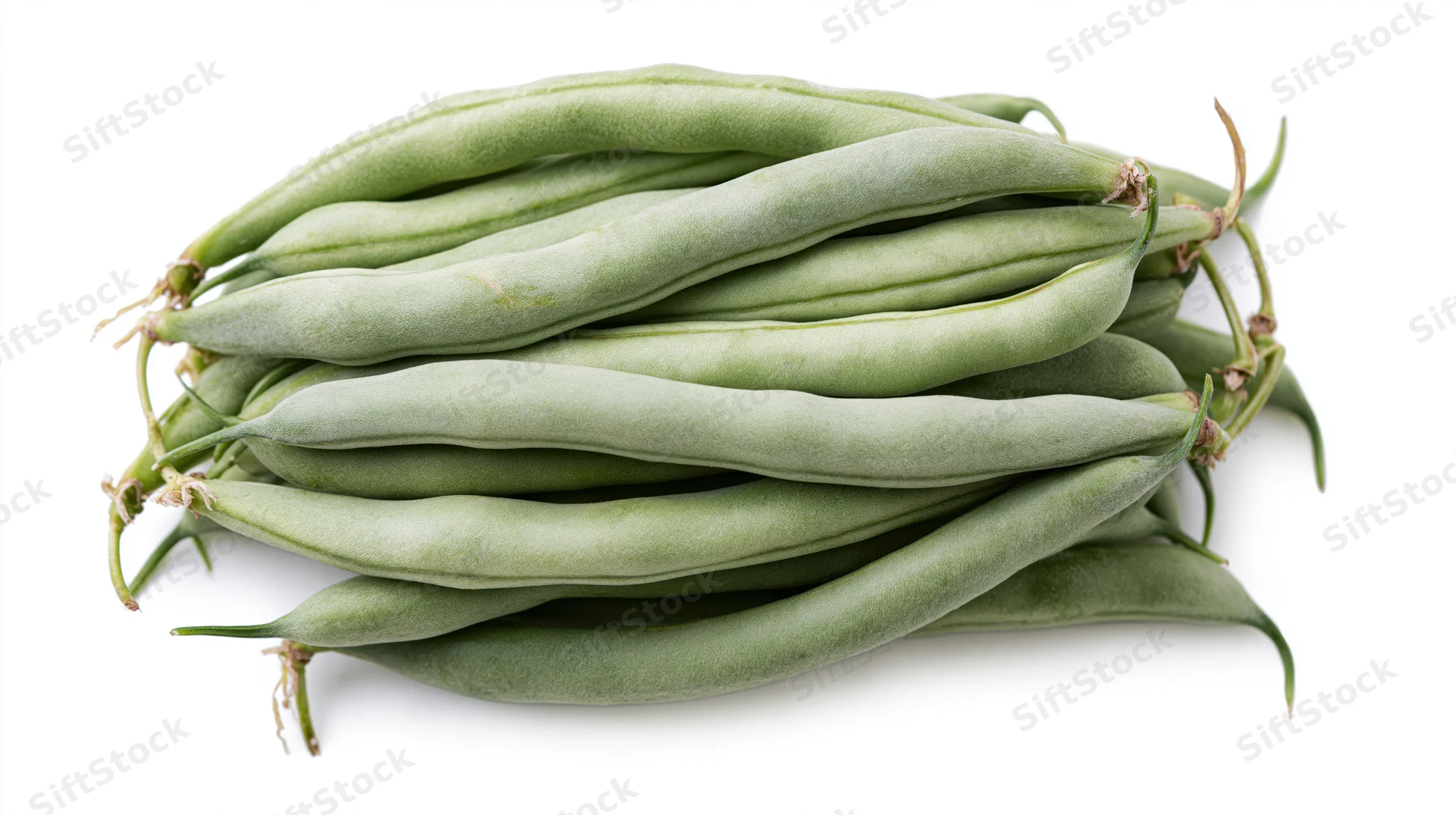 Pile of fresh raw green beans stacked horizontally on white background