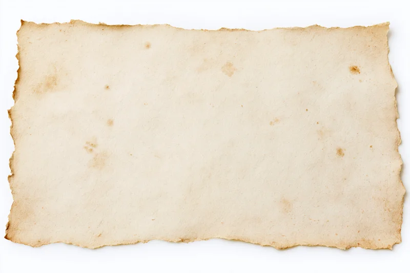 Vintage paper with torn edges and stains lying flat on white background