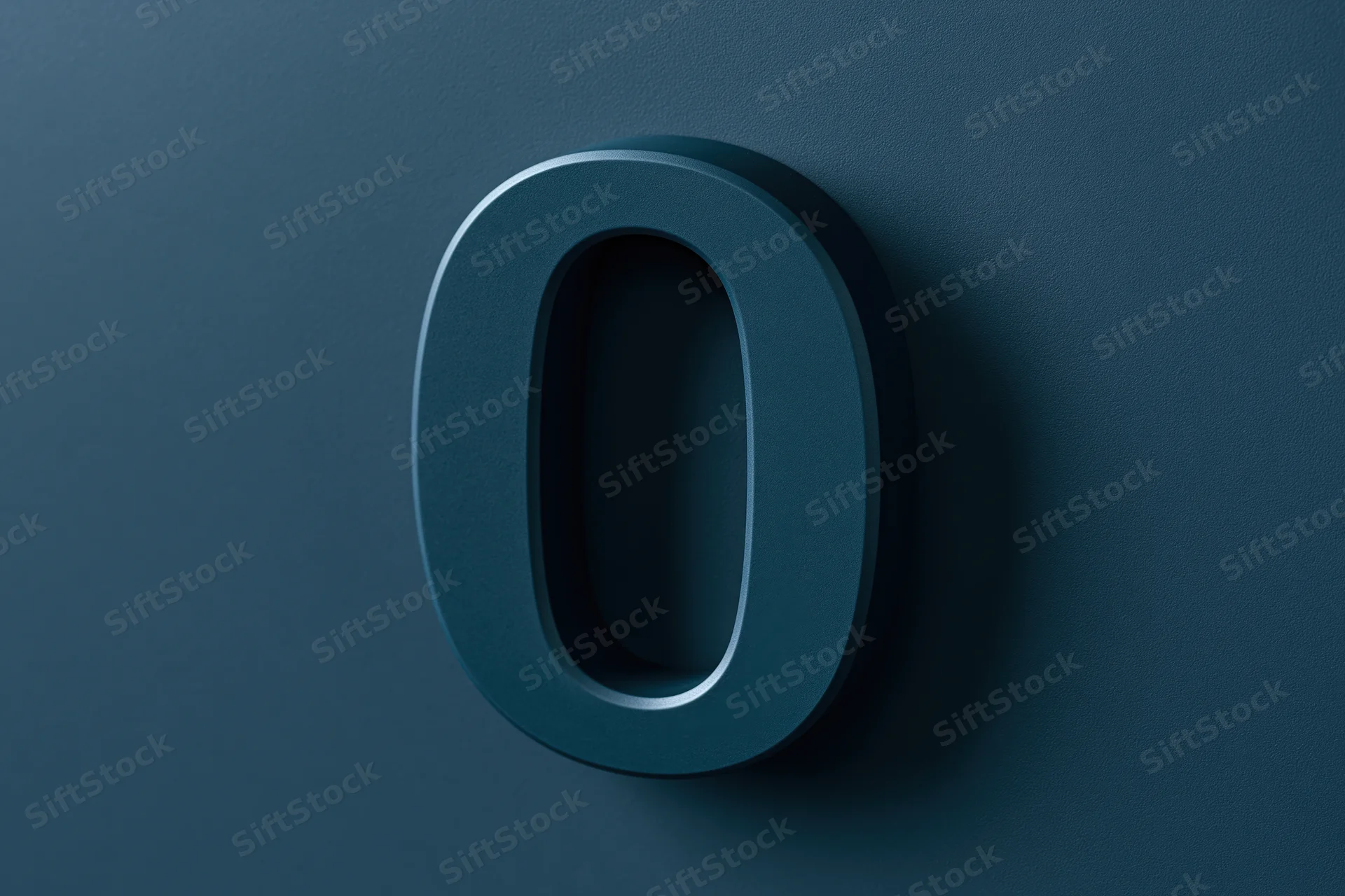 Three-dimensional matte dark teal zero on a textured surface