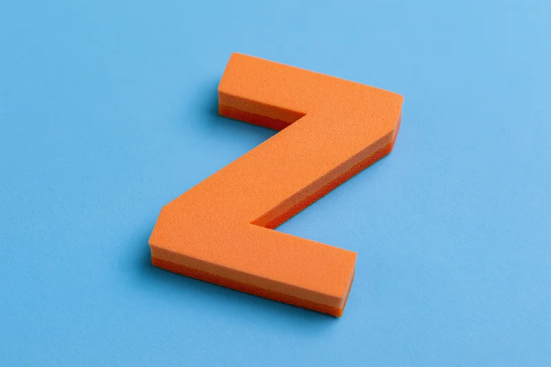 Orange foam letter z on bright blue background