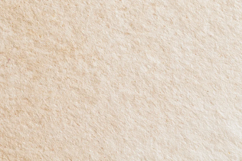 Aged paper or plaster wall surface filling the entire frame
