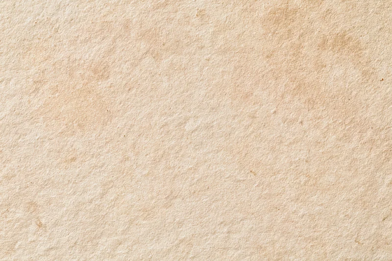 Textured aged paper or plaster surface filling the frame