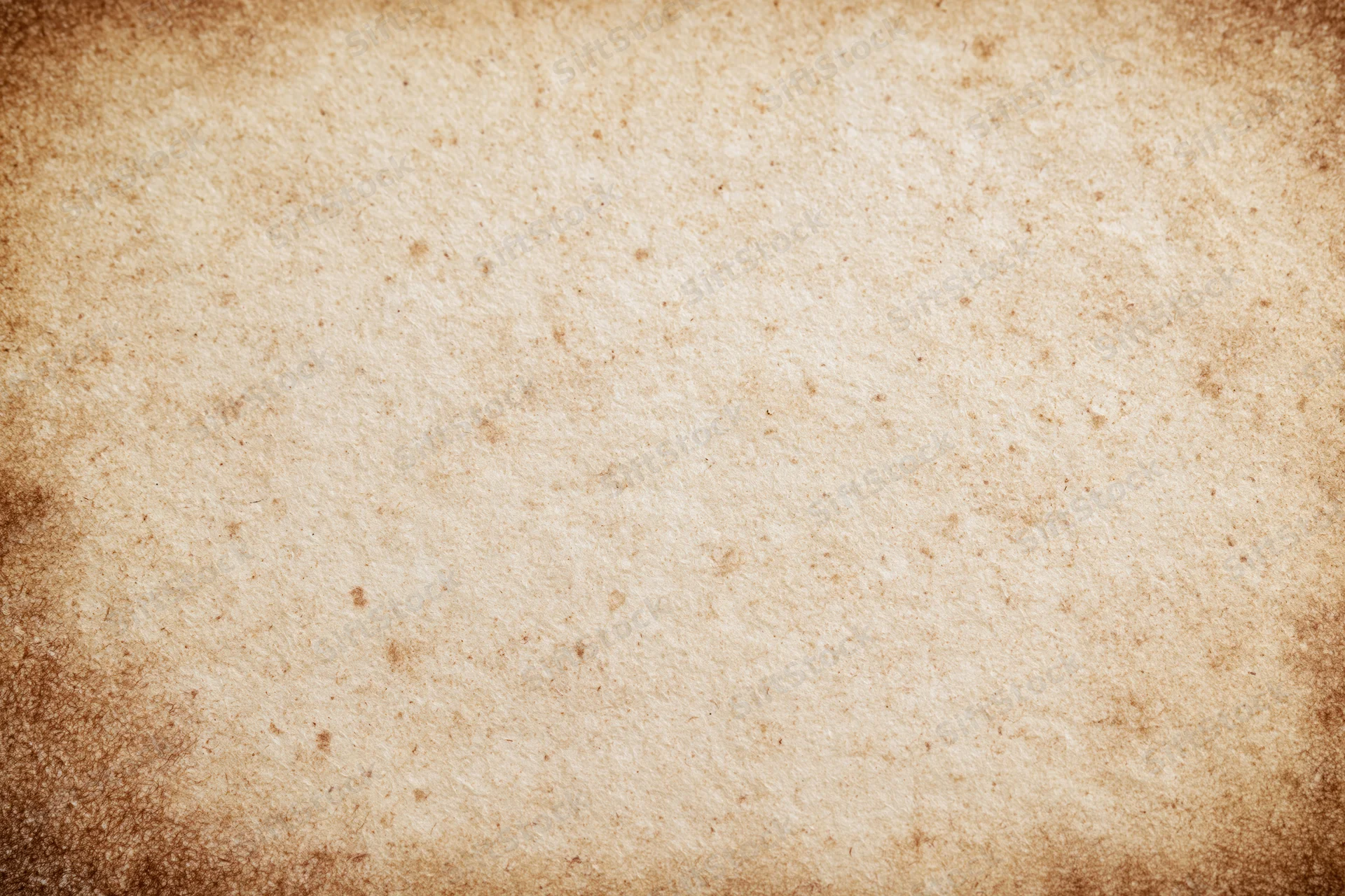 Aged parchment paper texture filling the frame with vintage brown tones and distressed surface