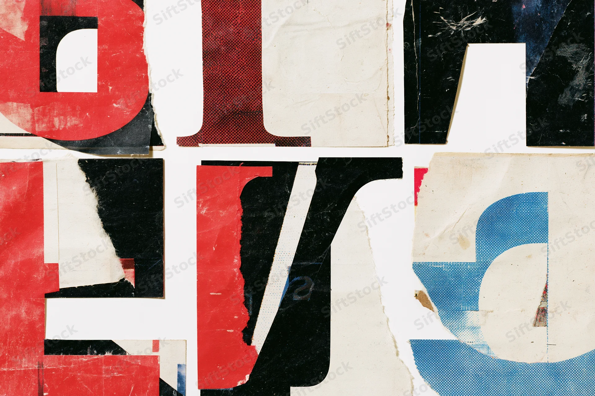 Torn paper cutouts of bold letters and numbers arranged in a grid on white background
