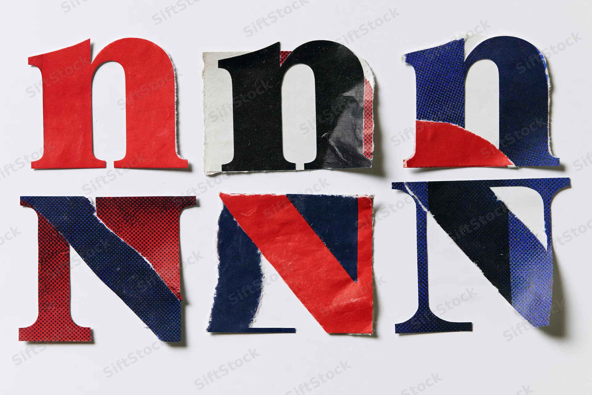 Six cut-out letters n and N arranged in a grid on a white background