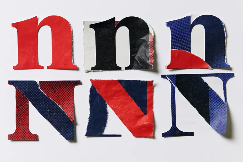 Six cut-out letters n and N arranged in a grid on a white background