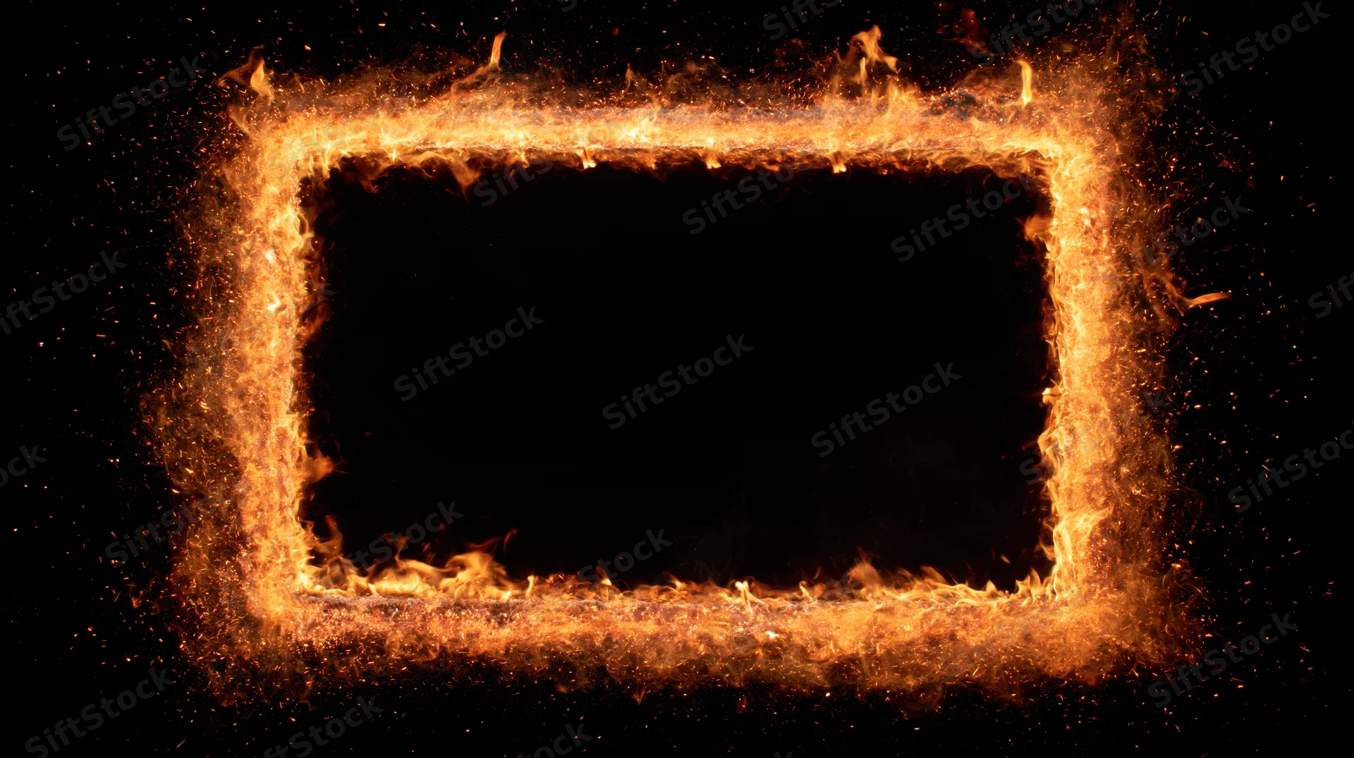 Rectangular frame of burning fire and glowing embers on black background with copyspace