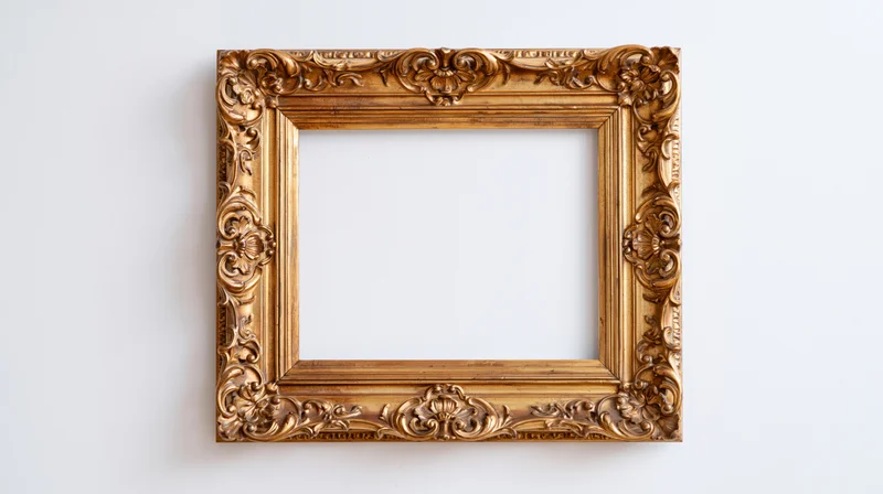Ornate gold baroque frame with floral carvings hanging on white wall