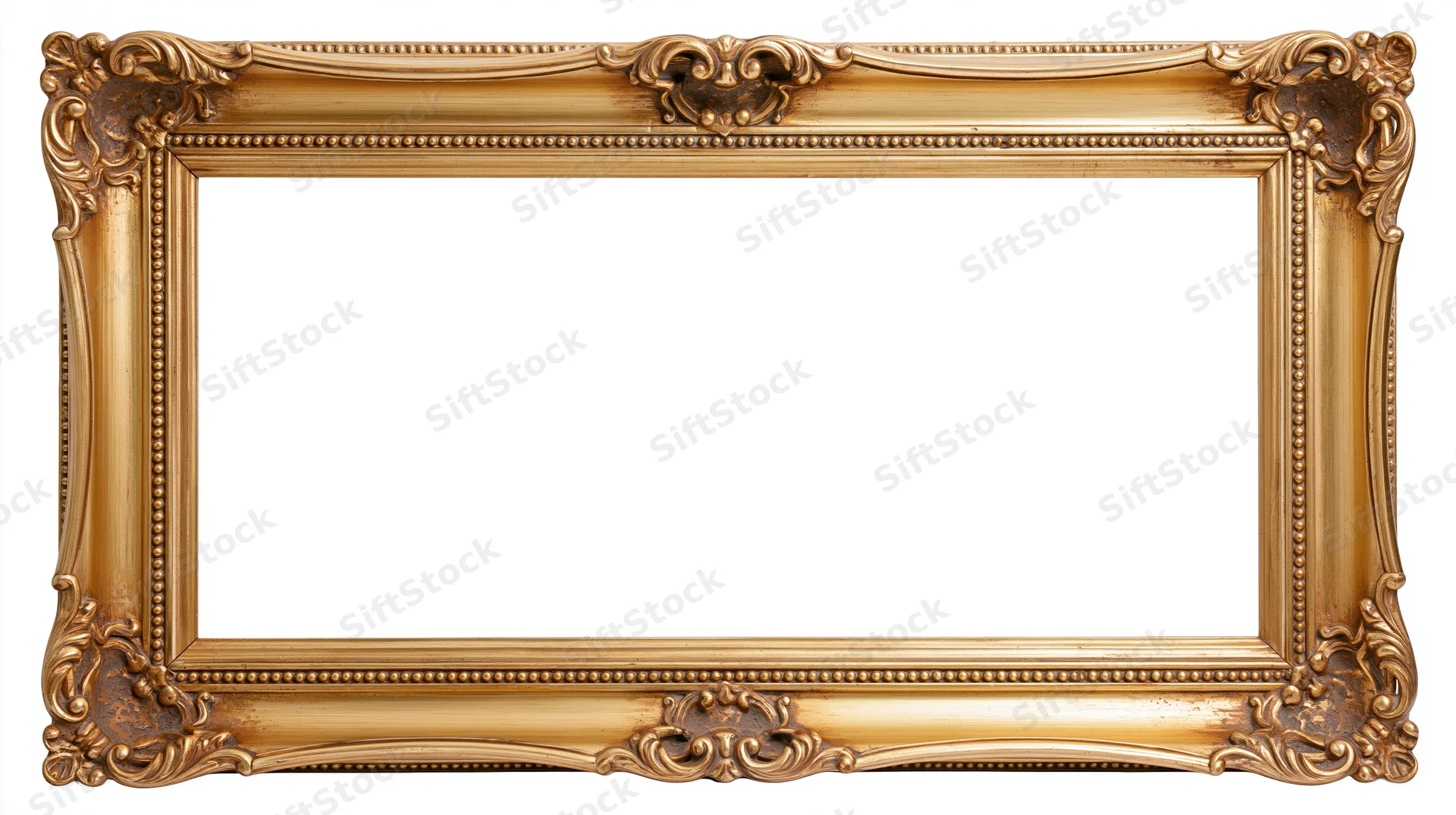 Ornate antique gold picture frame with baroque carvings isolated on white background
