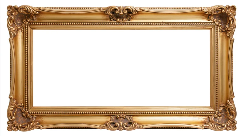 Ornate antique gold picture frame with baroque carvings isolated on white background