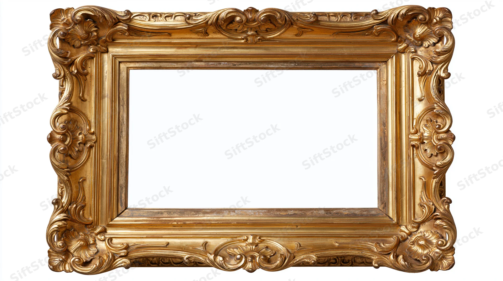 Ornate antique gold picture frame with baroque carved scrollwork isolated on white background