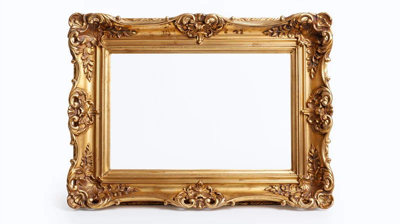 Ornate antique gold picture frame with baroque carvings isolated on white background