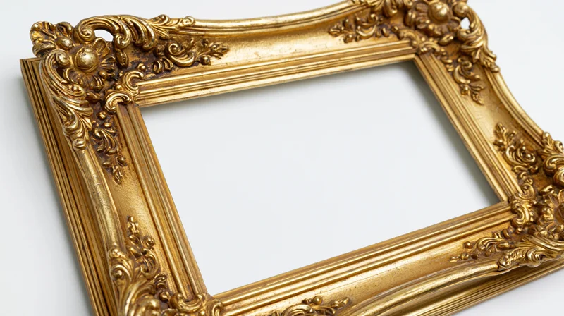 Ornate gold baroque frame with carved scrollwork on white background