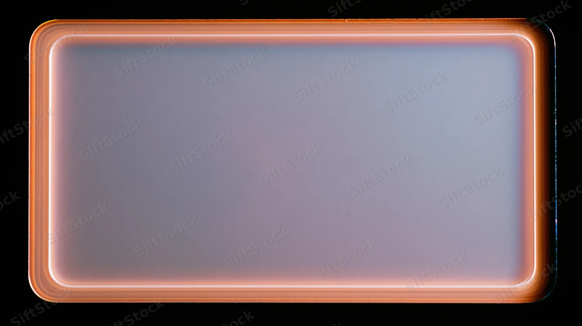 Blank overexposed analog film frame with glowing orange border on black background