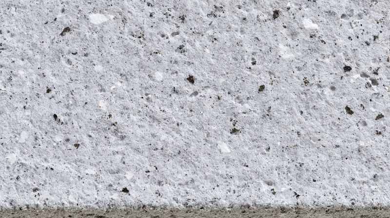 Close-up of a polished concrete terrazzo surface with embedded stone aggregates
