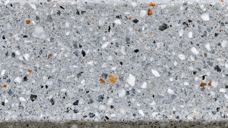Close-up of polished terrazzo floor surface with embedded stone aggregate