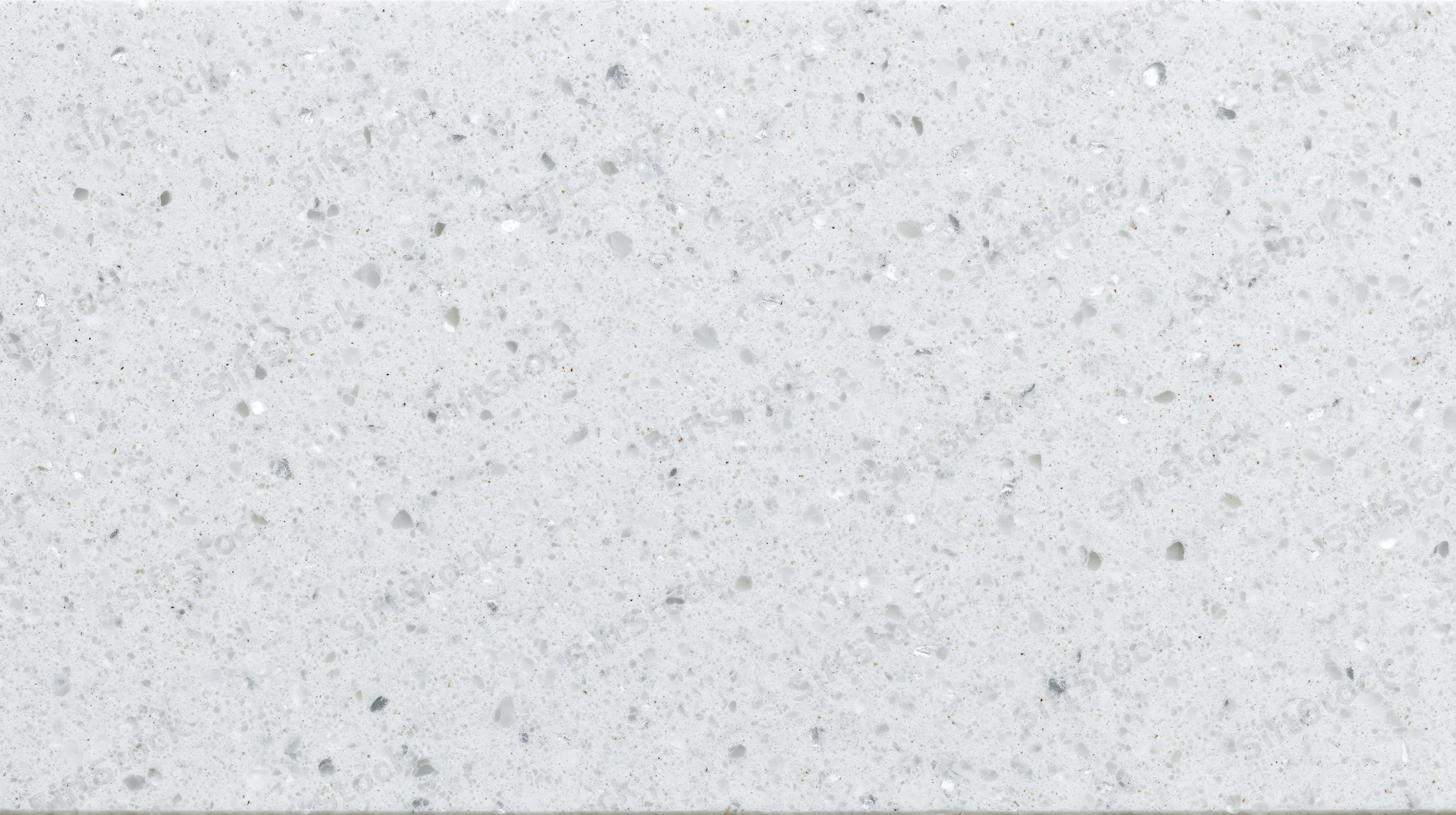 Close-up of white quartz composite countertop surface with speckled aggregate pattern