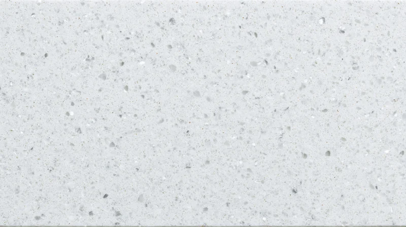 Close-up of white quartz composite countertop surface with speckled aggregate pattern