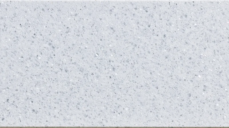 Close-up of a white speckled terrazzo or quartz composite countertop surface