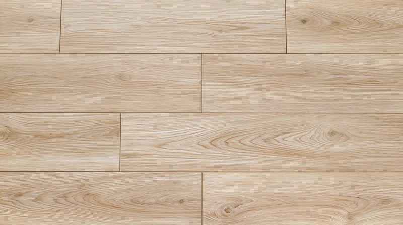 Close-up of light oak hardwood flooring planks arranged in a staggered pattern
