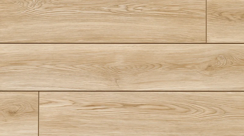 Close-up of light oak laminate flooring planks laid in a staggered pattern