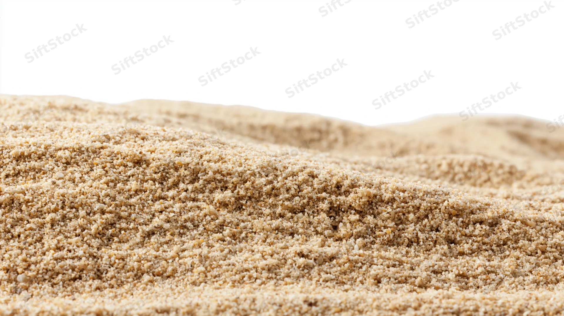 Close-up of dry beach sand texture filling the frame with white background