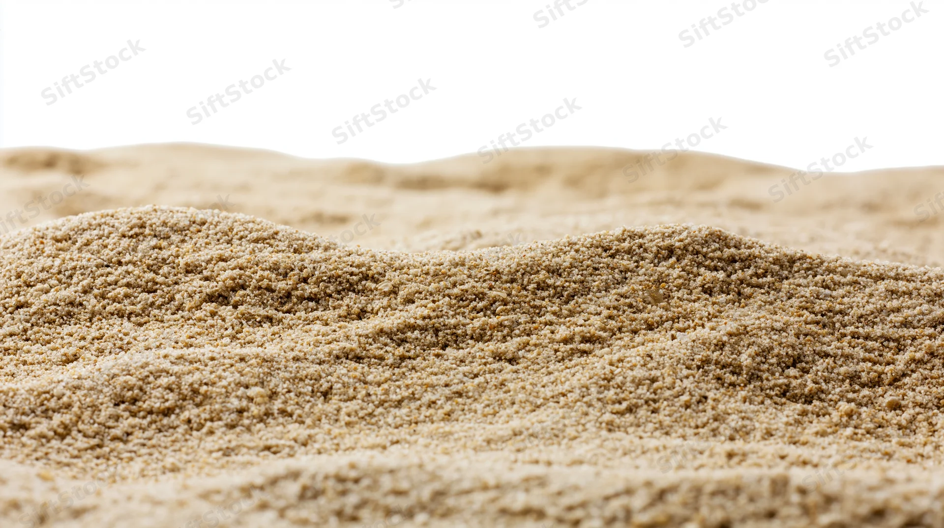 Close-up of dry beach sand texture filling the frame with white background