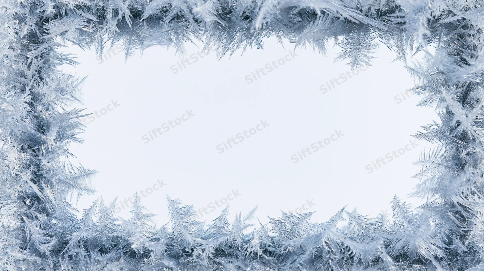 Frost crystal formations arranged as a frame with a white center