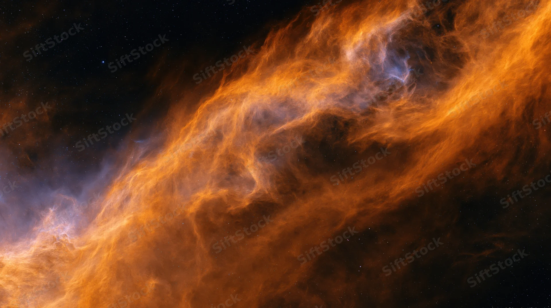 Glowing nebula cloud filling the frame with wispy orange and blue gas against dark space