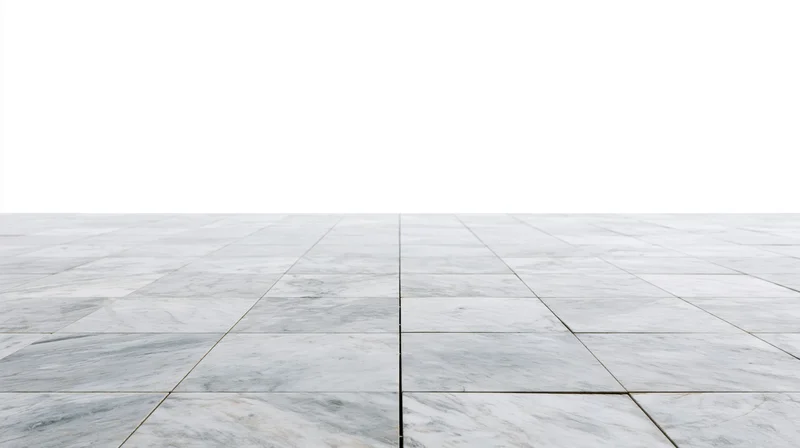 White marble tile floor extending into perspective with copyspace above