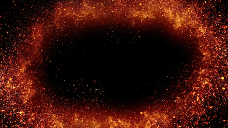 Glowing orange sparks and embers scattered around a dark central void