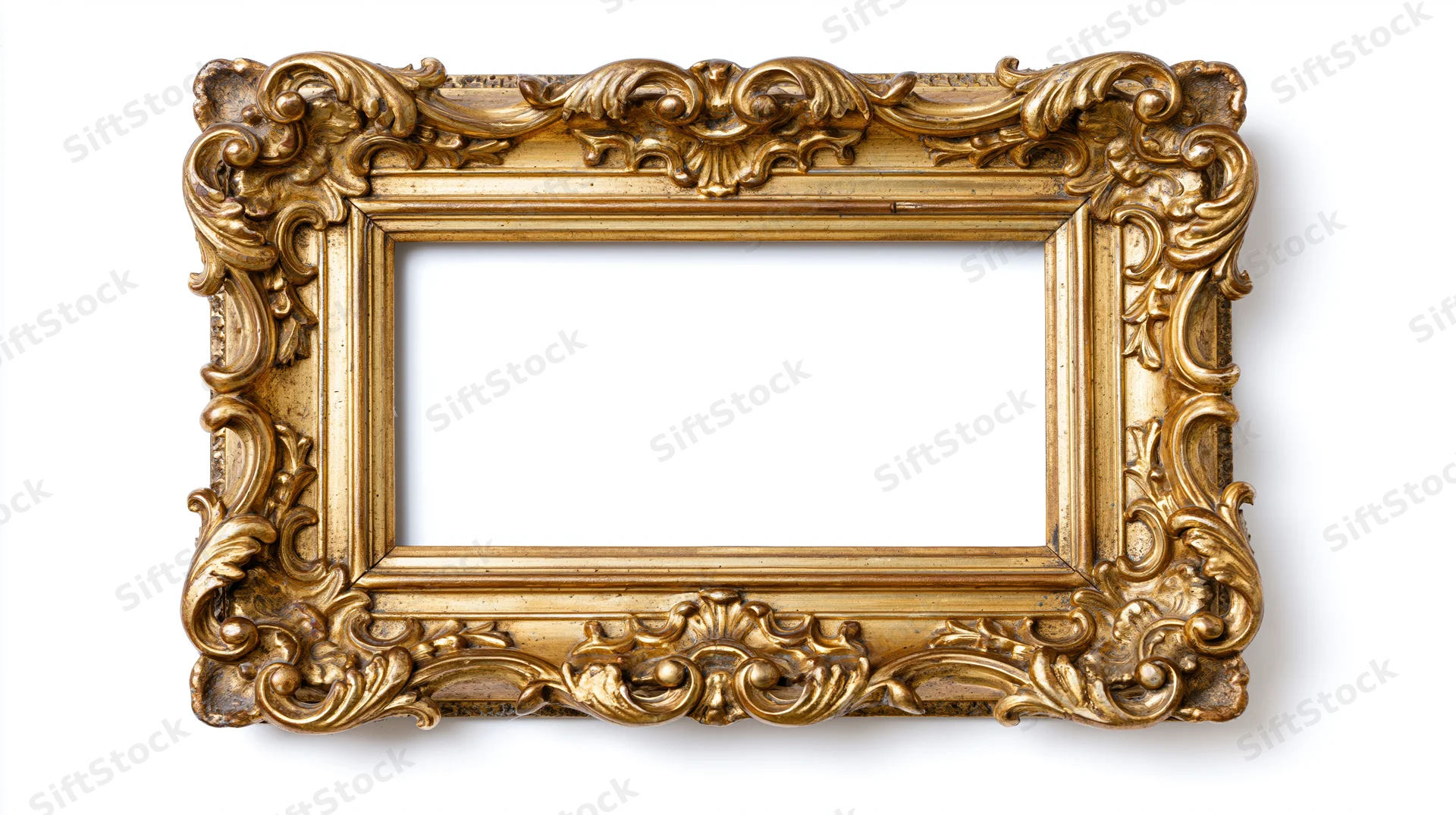 Ornate antique gold picture frame with baroque scrollwork isolated on white background