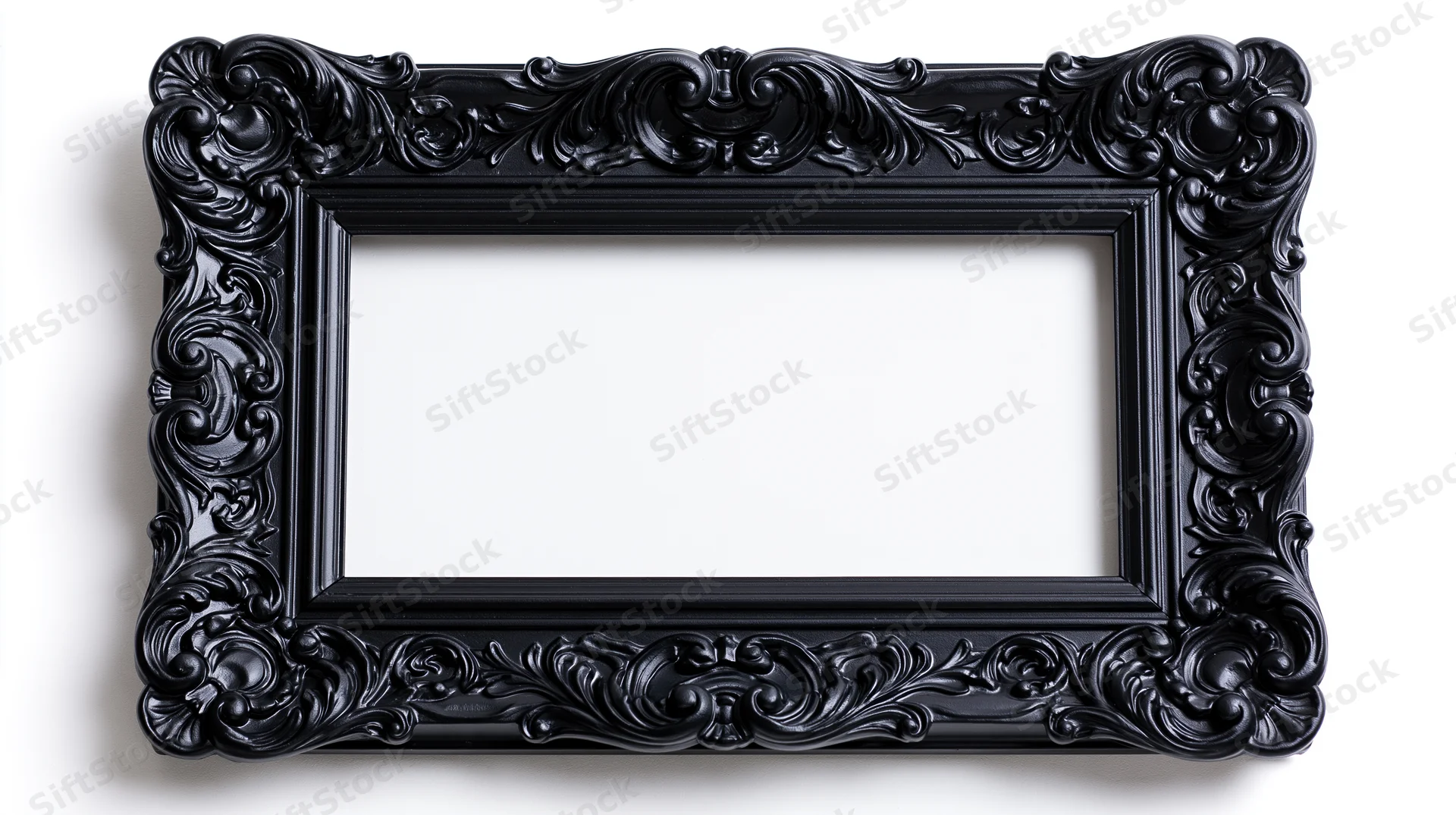 Ornate black baroque picture frame with elaborate carved scrollwork isolated on white background